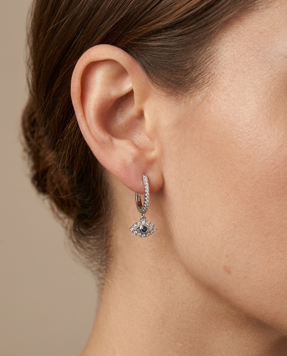 Diamond Evil Eye Dangling Earrings in White Gold on model