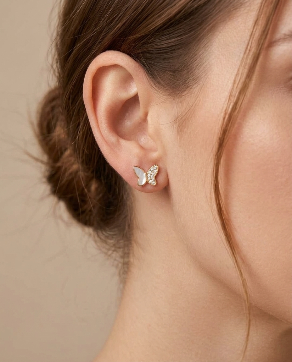Diamond and Mother of Pearl Butterfly Earrings in Yellow Gold on model
