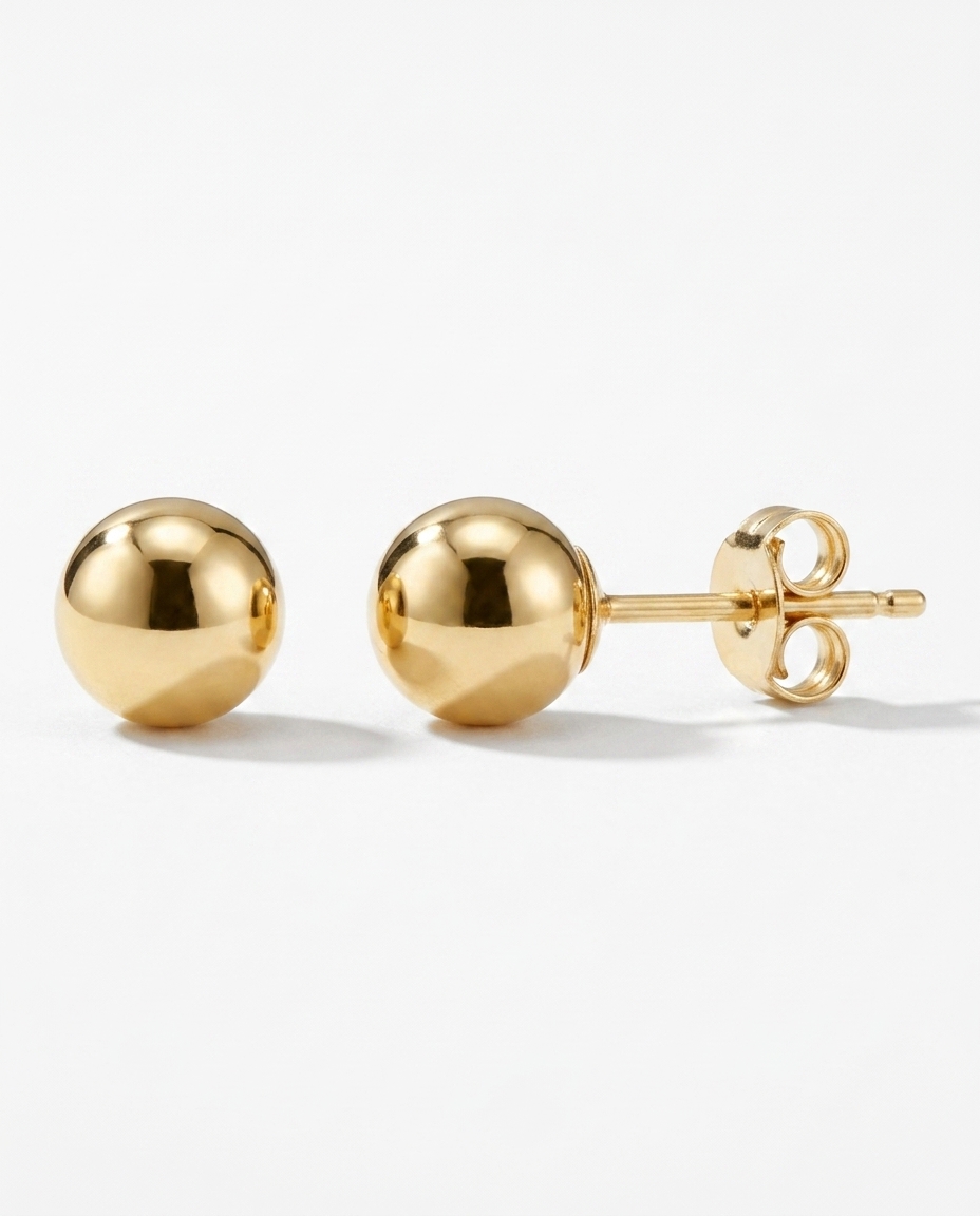 Ball Earring in Yellow Gold on model
