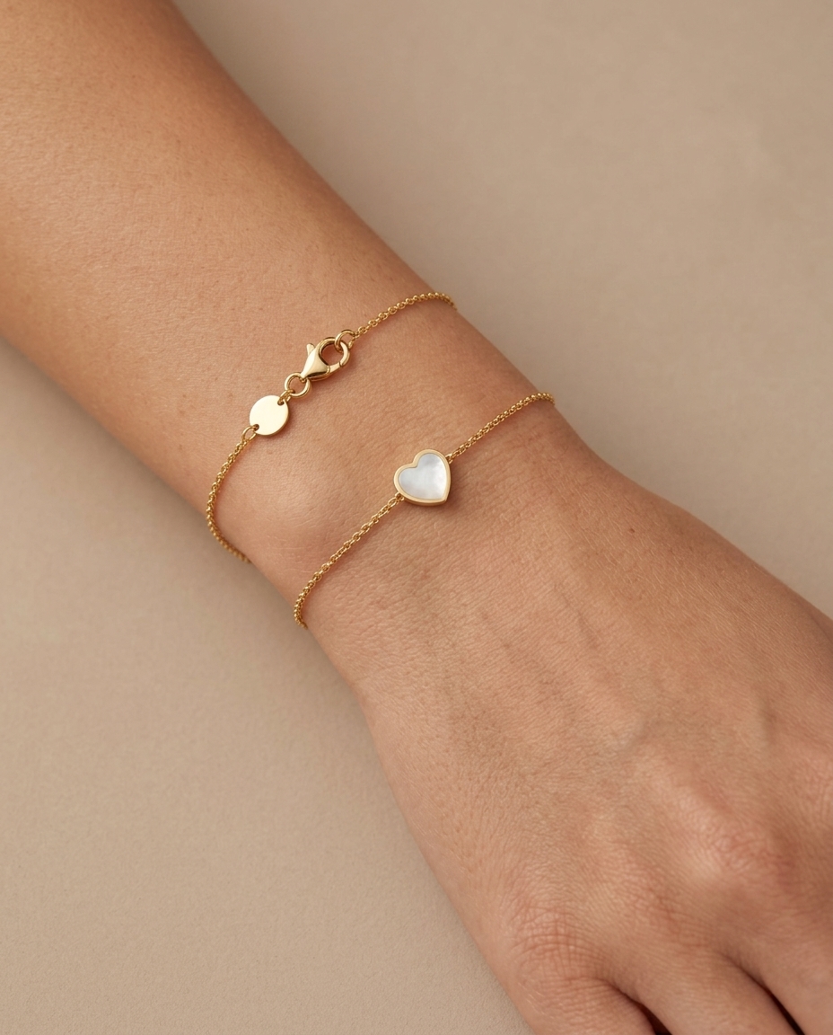 14KT Gold Mother of Pearl Heart Bracelet on model