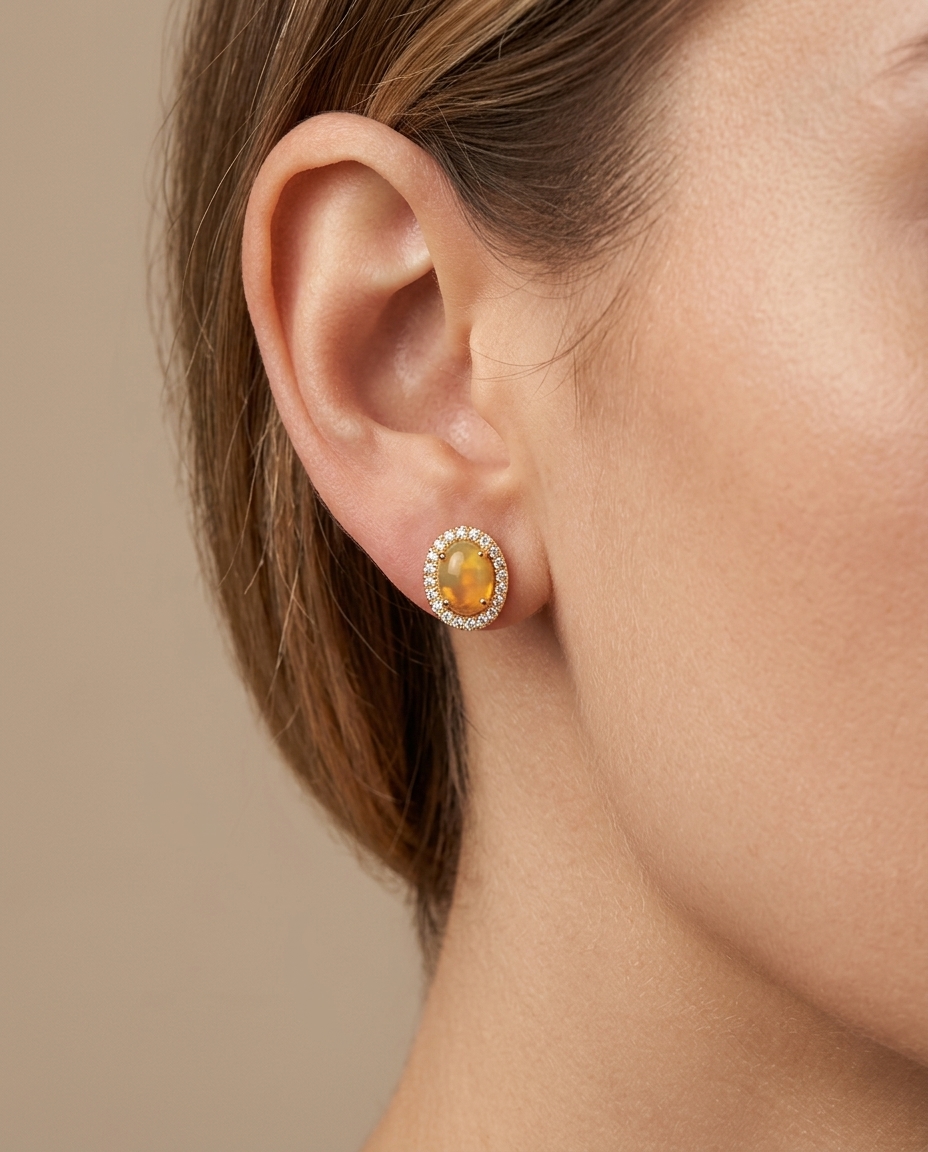 14KT Gold Diamond Ethiopian Opal Oval Shape Earring on model