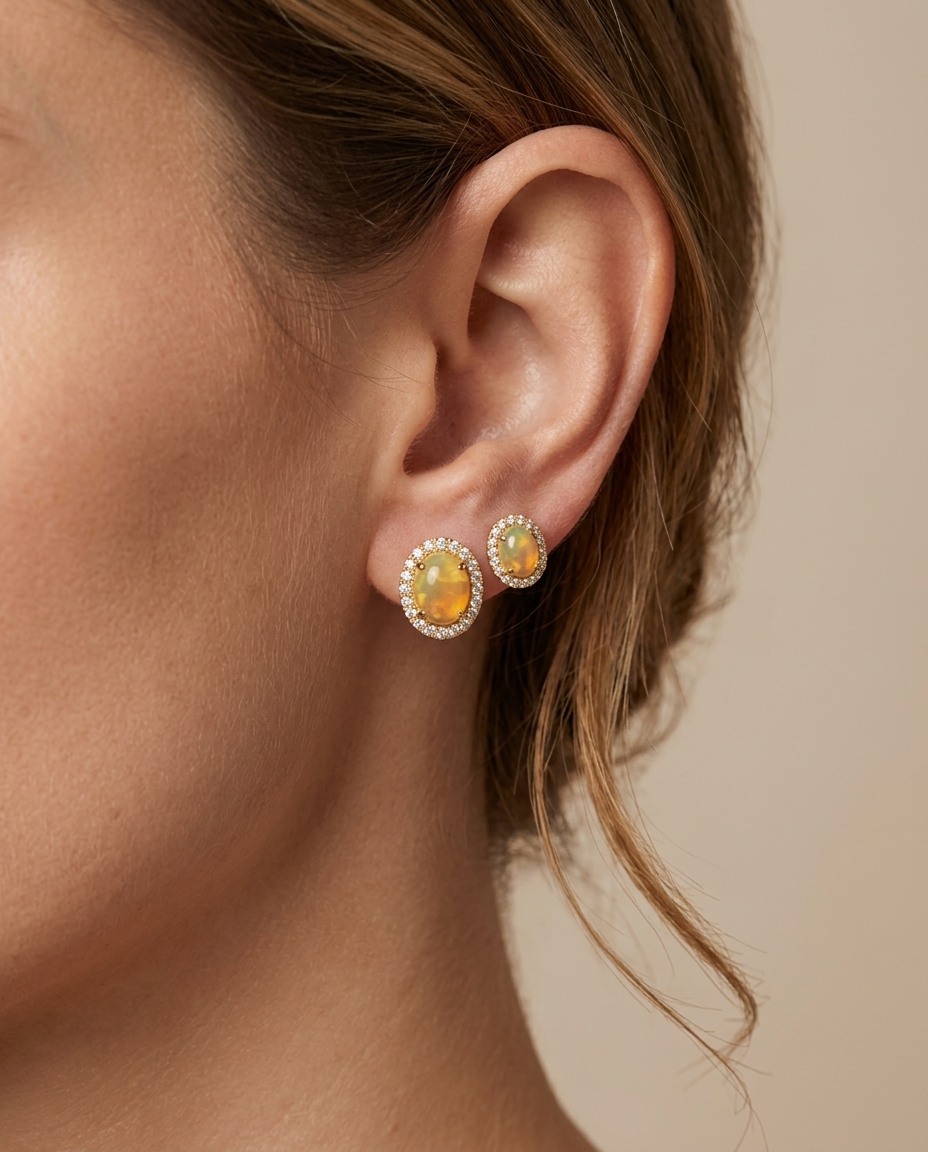 14KT Gold Diamond Ethiopian Opal Oval Shape Earring on model