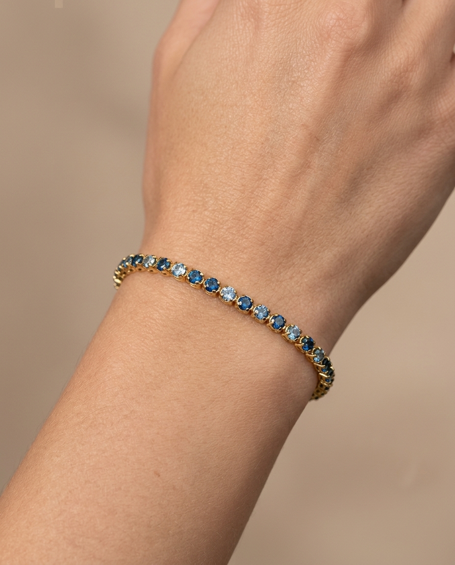 14KT Gold Blue Diamonds Tennis Bracelet 2.00 Cts on model