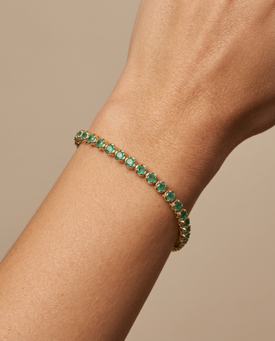 14KT Gold Emerald Bracelet 4.00 Cts on model