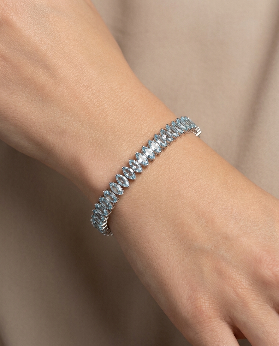 14KT White Gold Marquise Shape Aquamarine Tennis Bracelet on model