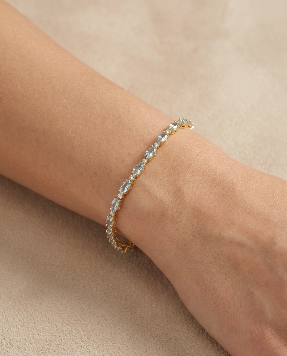 14KT Gold Marquise Shape Aquamarine Tennis Bracelet on model