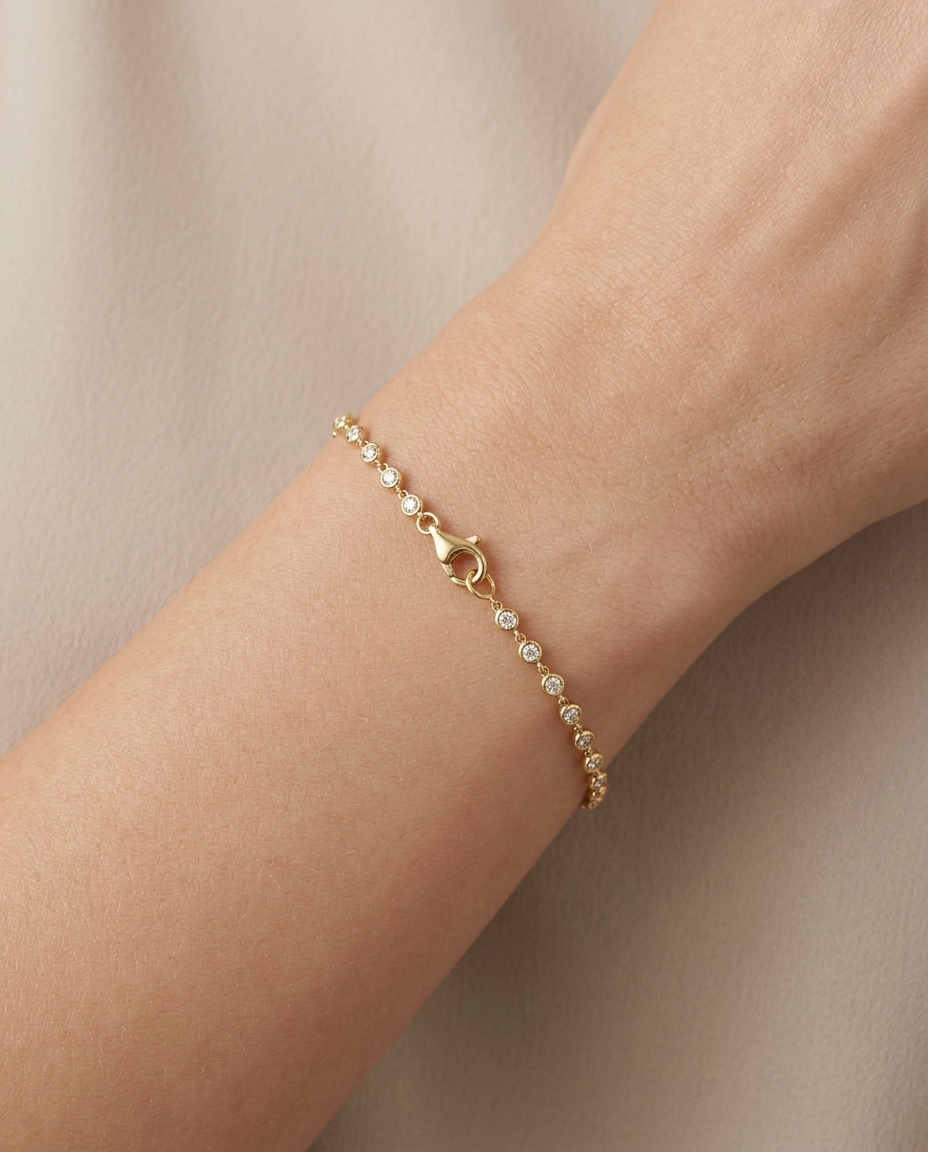 14KT Gold Bezeled Diamond Station Bracelet on model