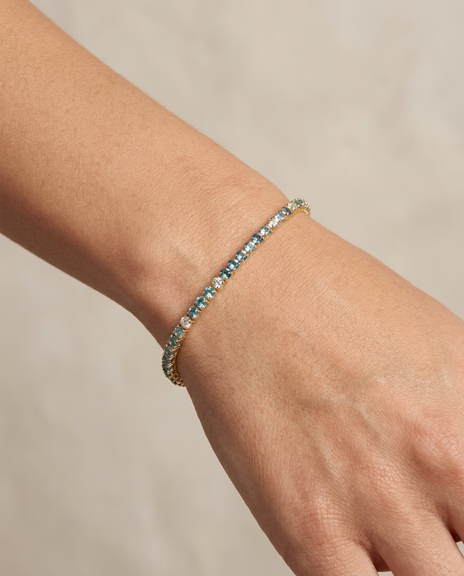 14KT Gold Blue Aquamarine and Diamond Tennis Bracelet on model