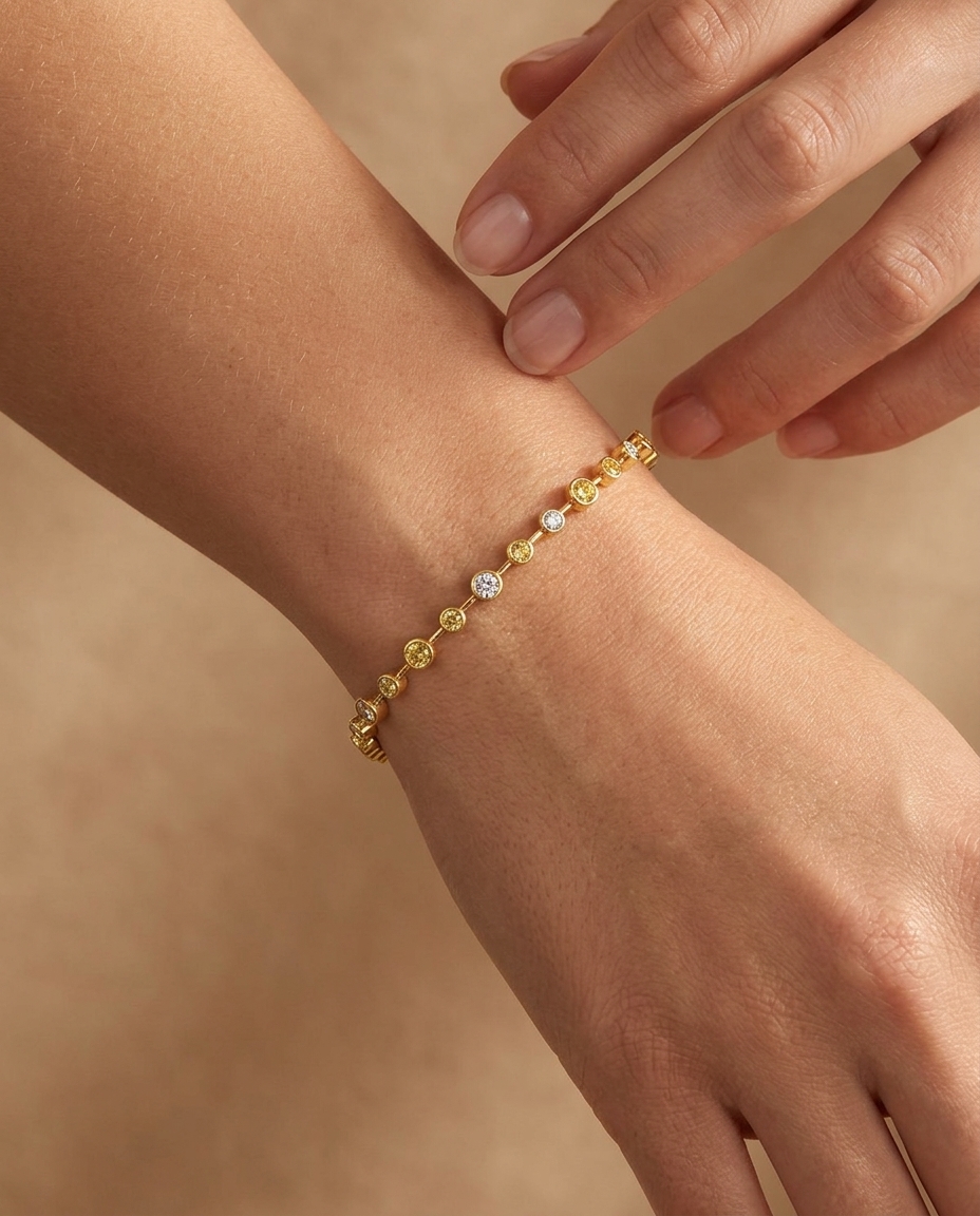 14KT Gold Station Diamond Bezel Tennis Bracelet (1.50CTS) on model