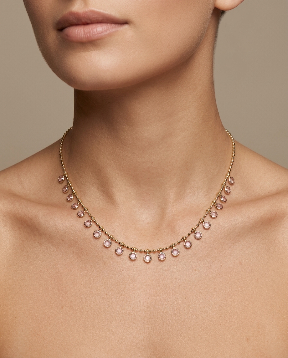 14KT Gold Pink Sapphire Dangling Necklace on model