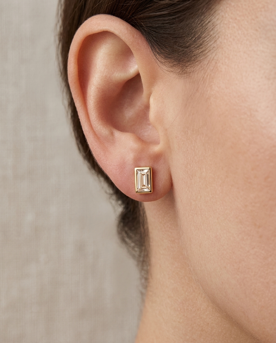 14KT Gold Bezel Set Diamond Stud Earing on model