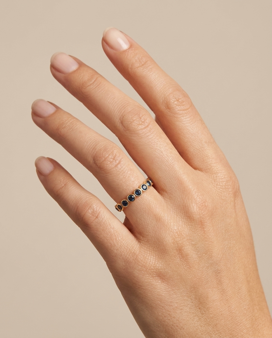 14KT Gold Blue Sapphire Ring on model