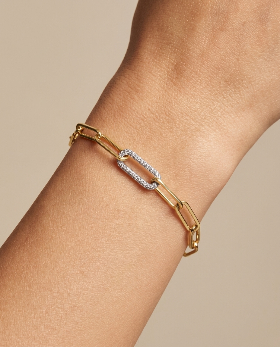 14KT Gold Paperclip Chain with One Diamond Link Bracelet on model