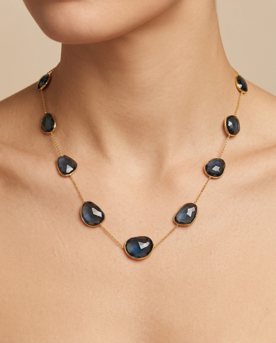 18KT Gold Bazeled London Blue Topaz Station Necklace on model