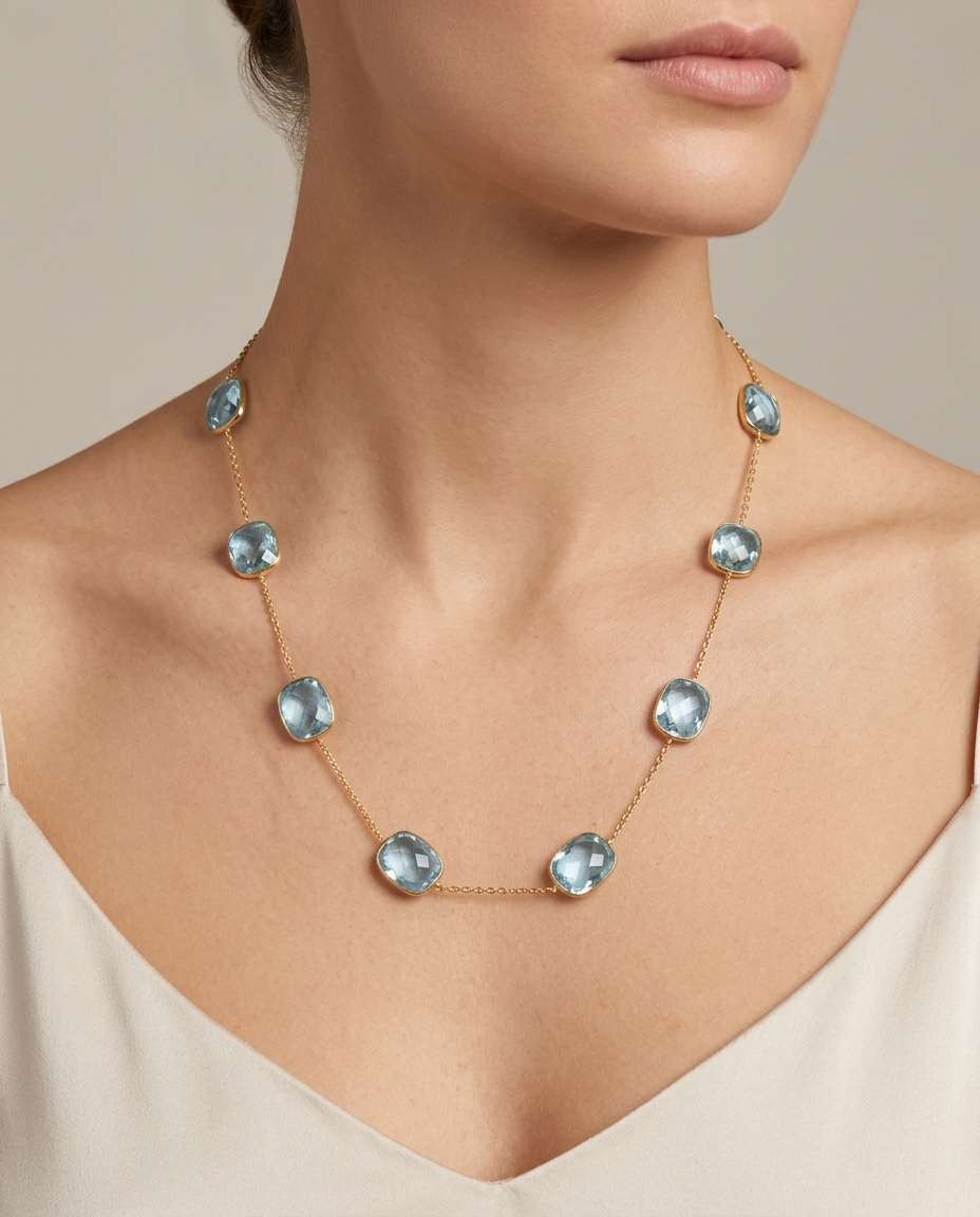 18KT Gold Bazeled Blue Topaz Station Necklace on model