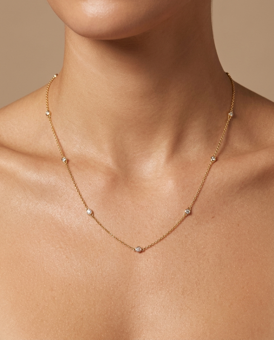 14KT Gold Diamond Station Necklace on model