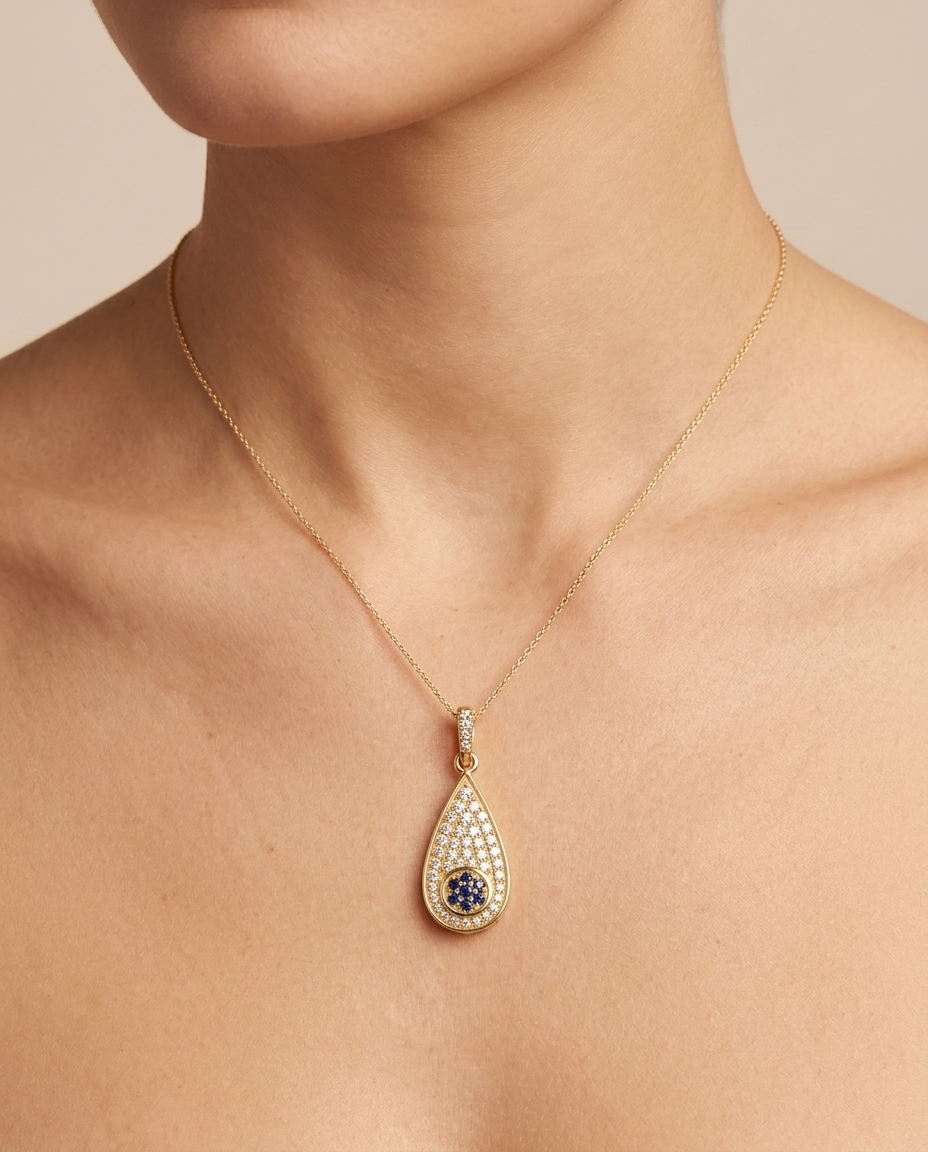 14KT Gold Pear Shape Blue Sapphire and Diamond Pendant Without Chain on model