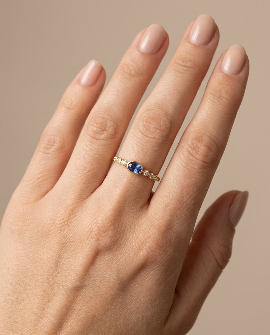 14KT Yellow Gold Tenzanite Ring with Diamonds on model