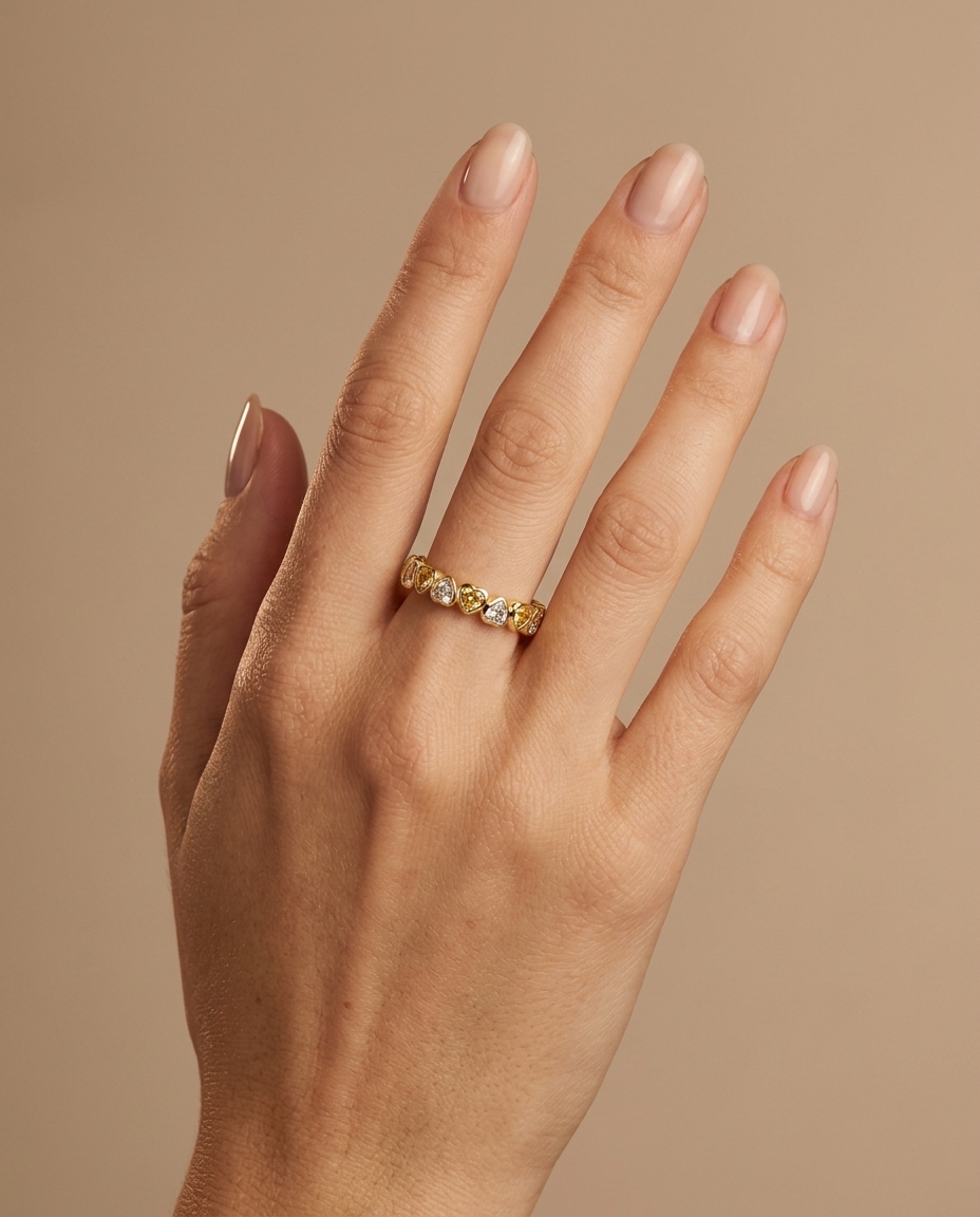14KT Yellow Gold Bezeled Yellow Sapphire Heart Eternity Band on model