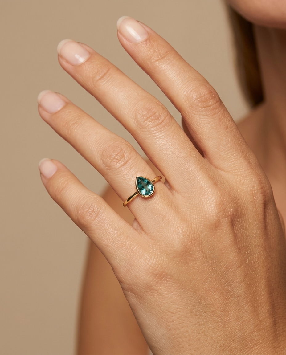 14KT Yellow Gold Emerald Ring on model