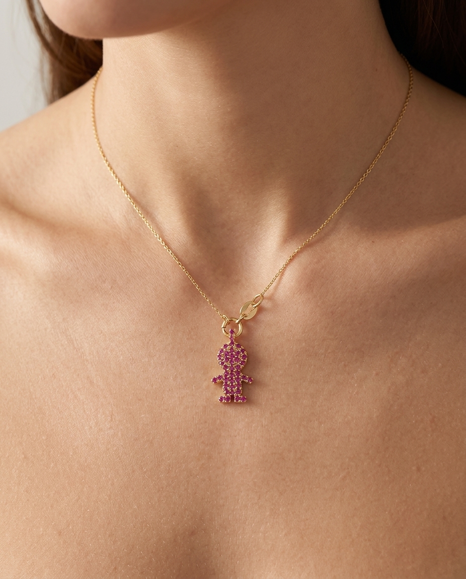 14KT Yellow Gold Boy Pendant with Ruby on model