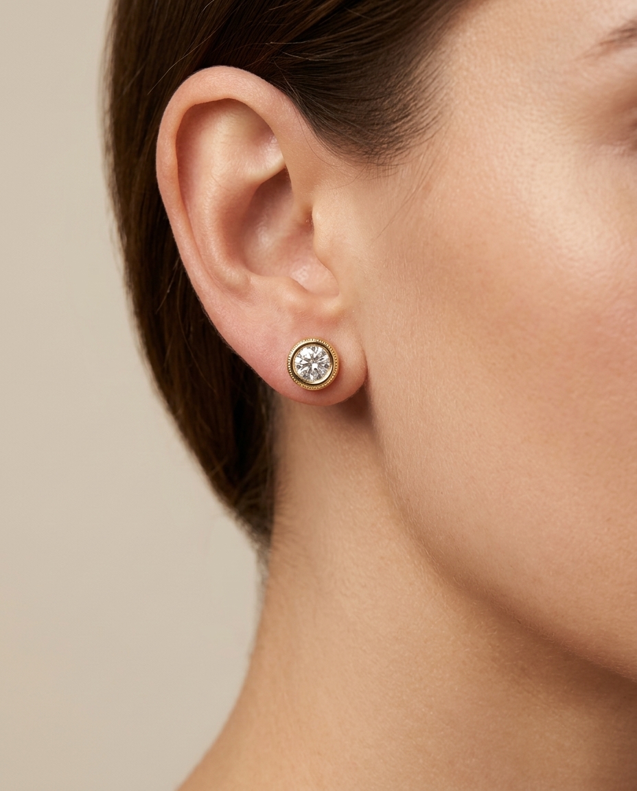 14KT Yellow Gold Bezel Set Diamond Stud Earring on model