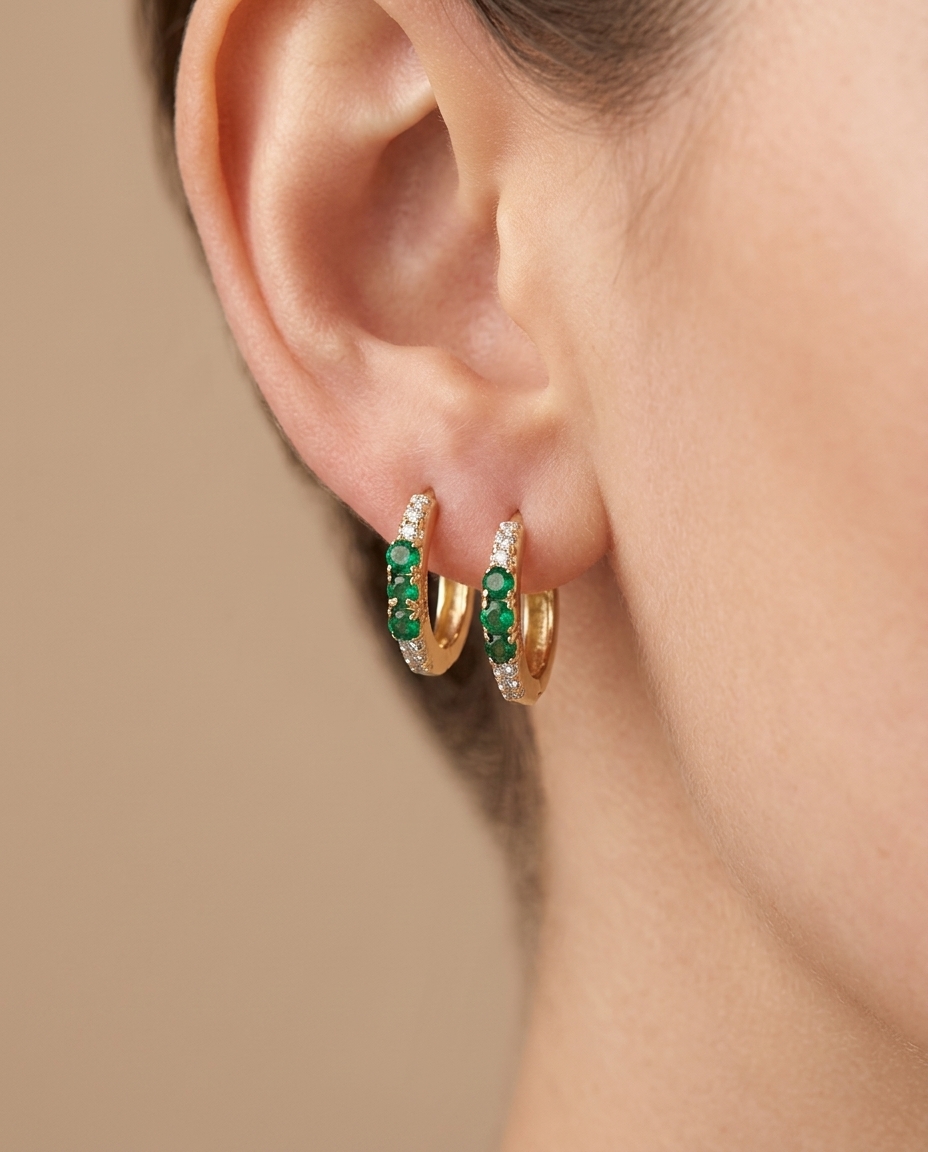 14KT Yellow Gold Diamond and Emerald Huggies Earring on model