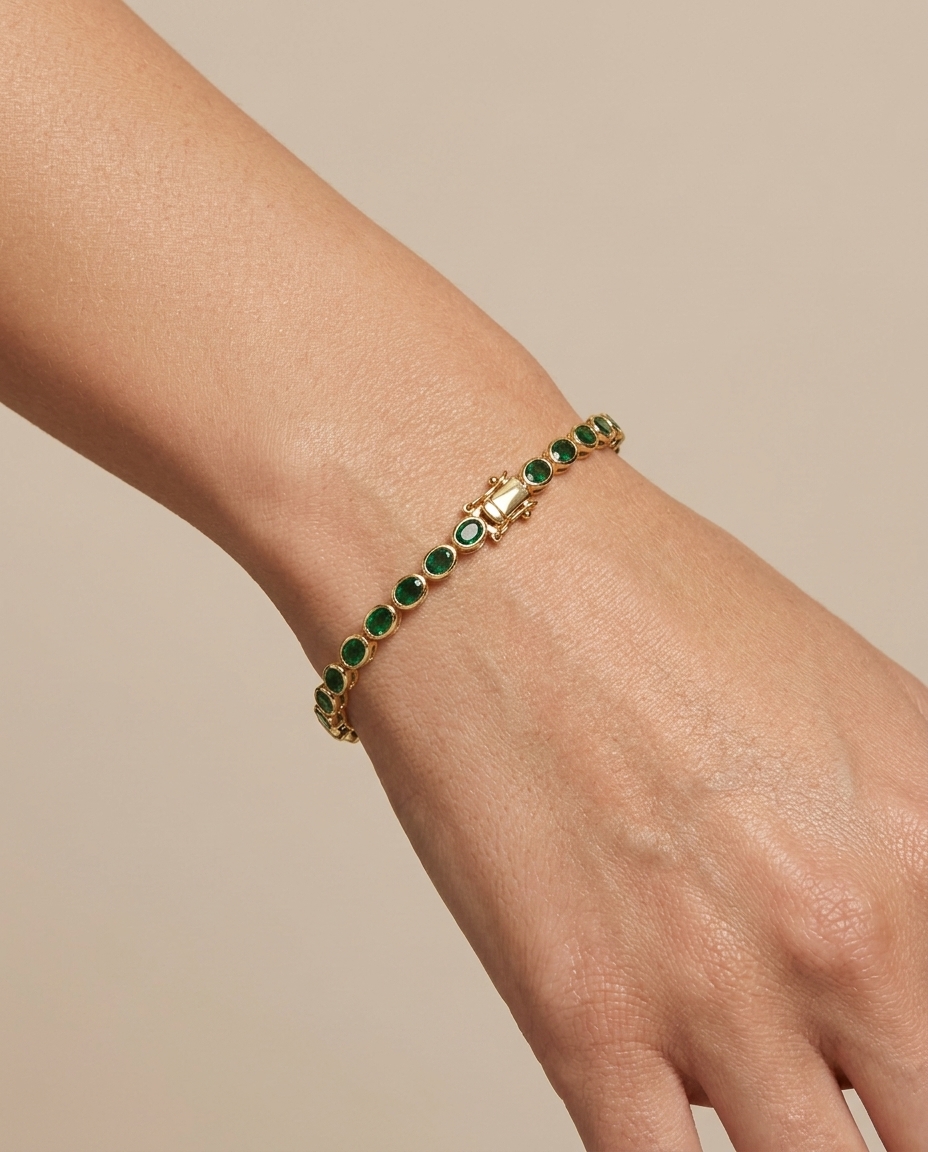 14KT Yellow Gold Oval Shape Bezeled Emerald Bracelet view 2