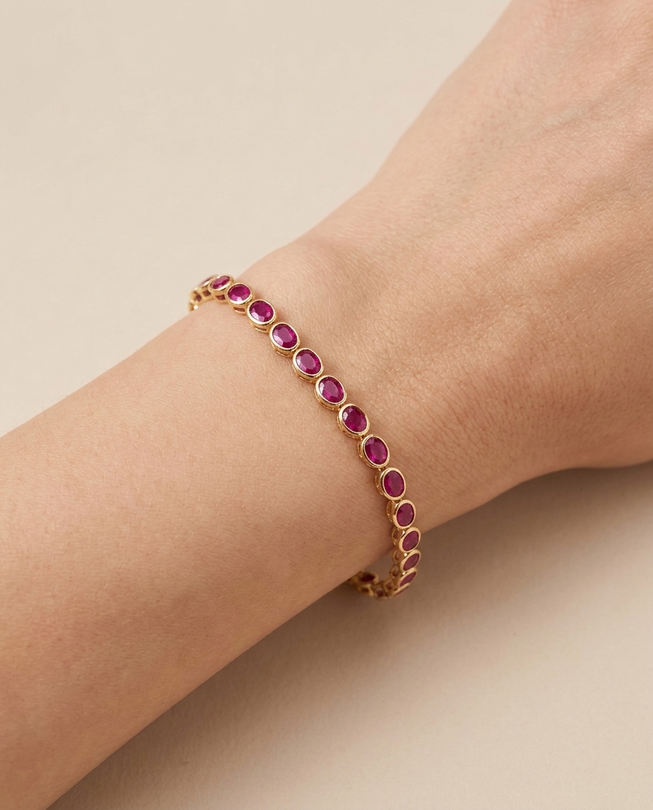 14KT Yellow Gold Oval Shape Bezeled Ruby Bracelet on model
