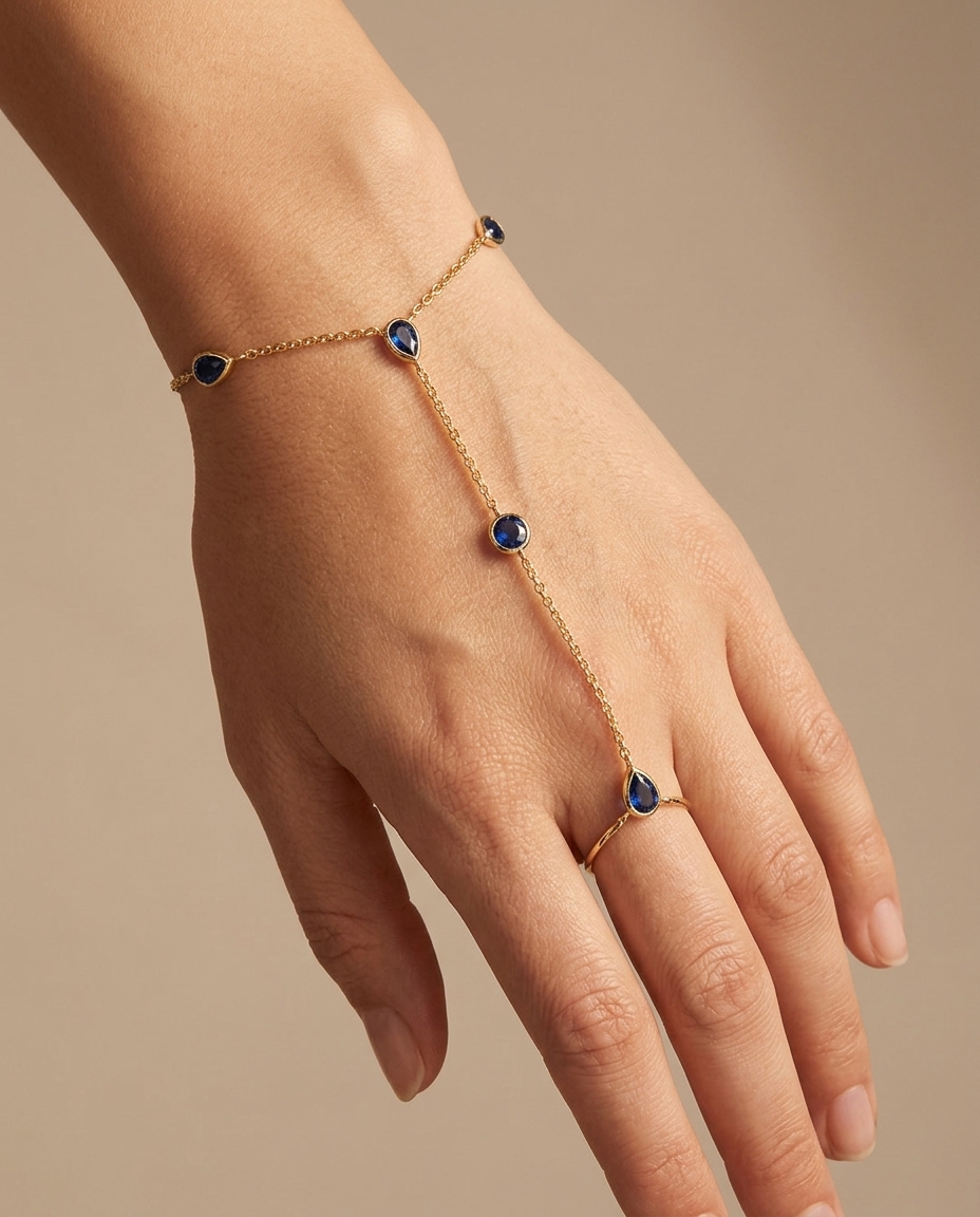 14KT Gold Blue Sapphire Hand Chain on model