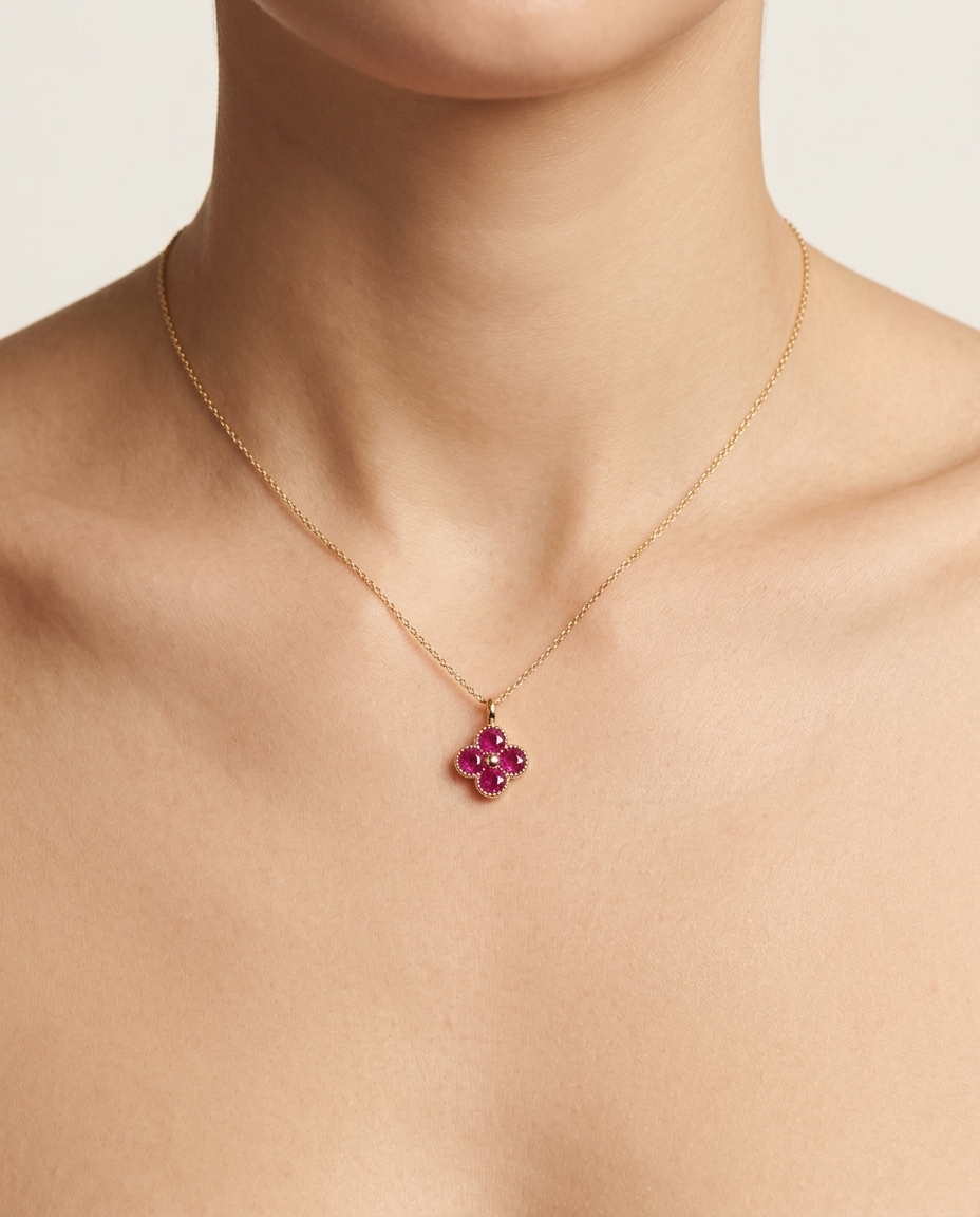 14KT Gold Ruby Clover Pendant on model