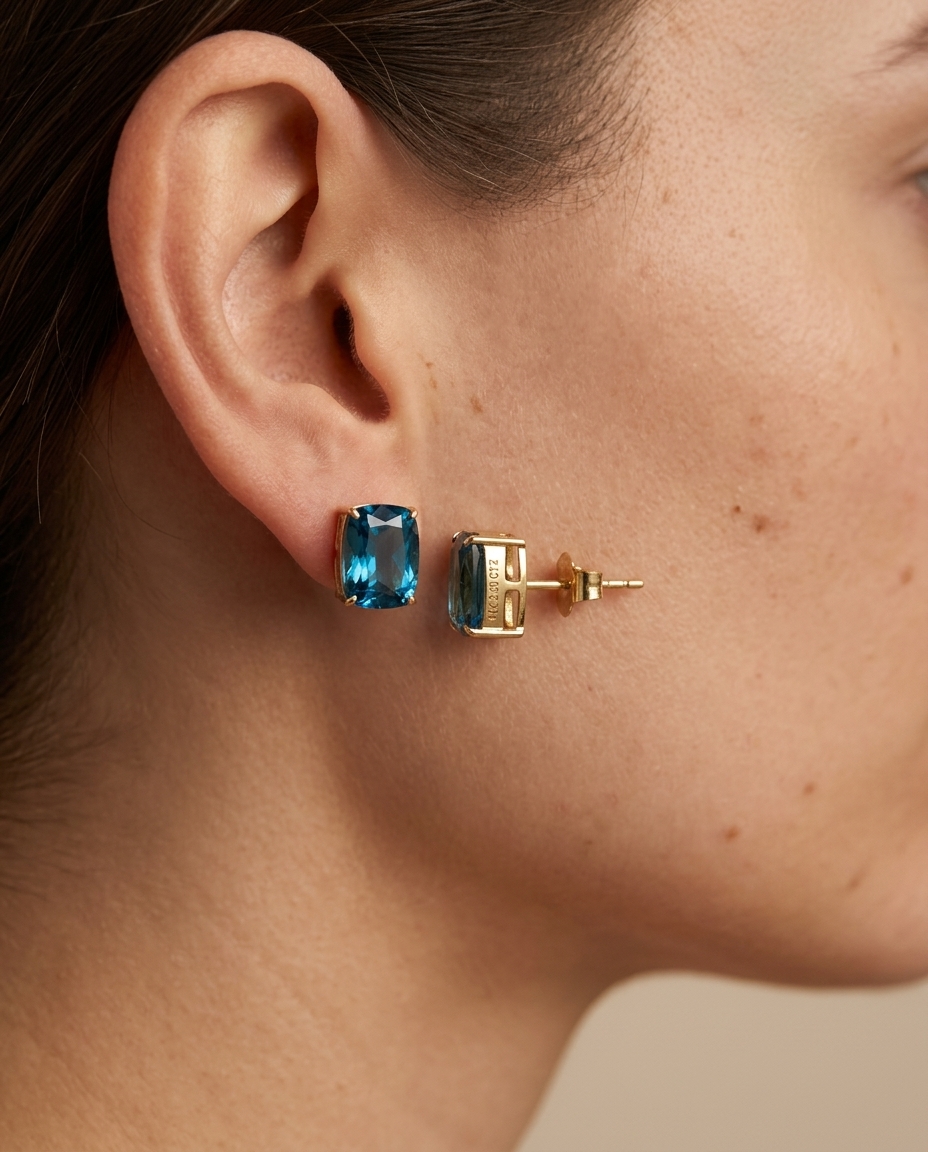 14KT Yellow Gold Blue Topaz Radiant Earring Studs on model