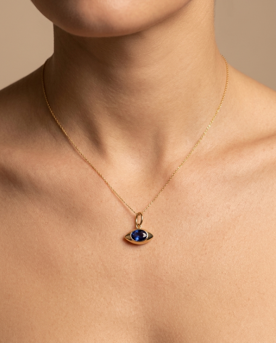 14KT Yellow Gold Blue Sapphire Evil Eye Pendant on model