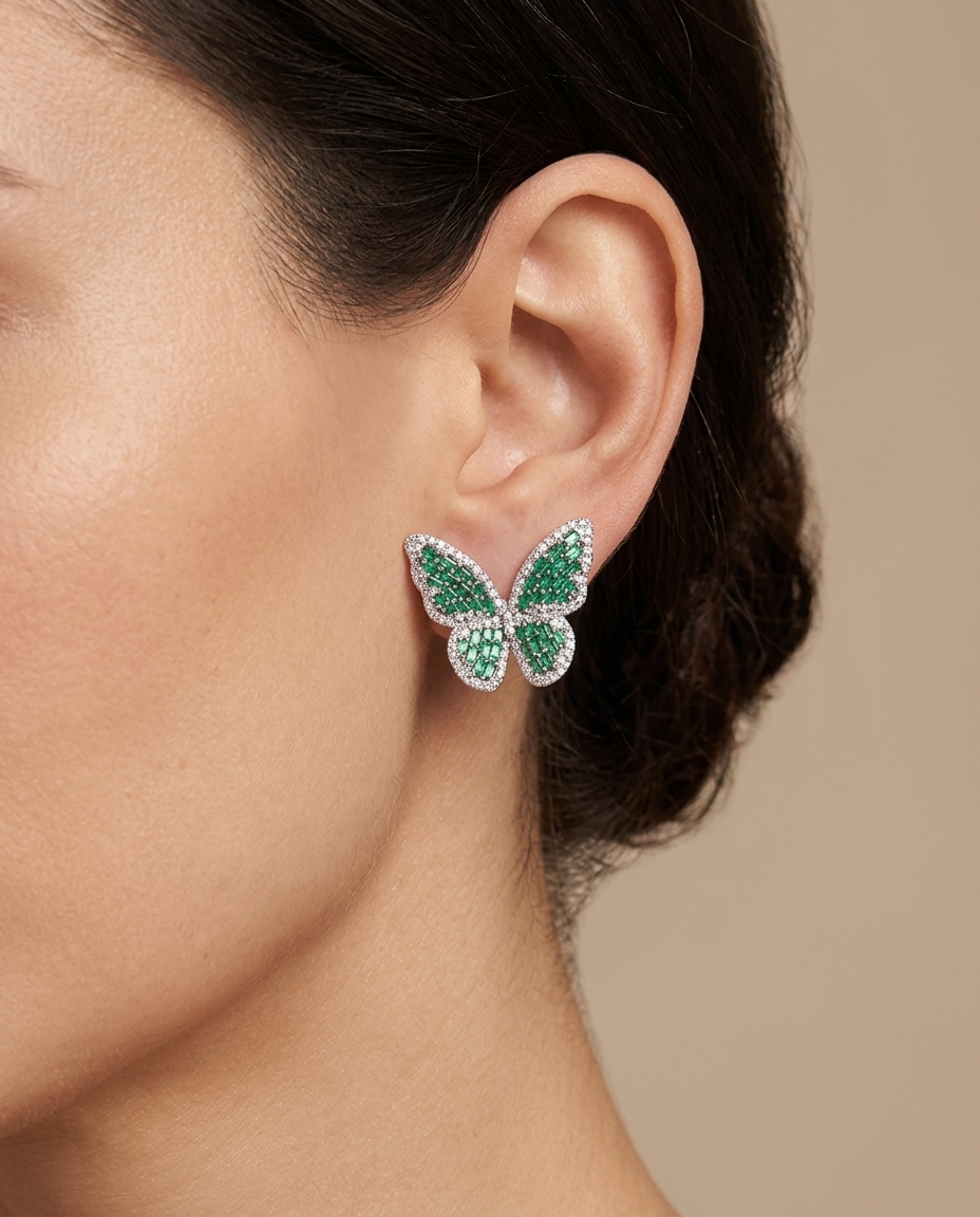 14KT White Gold Emerald and Diamond Butterfly Earring on model
