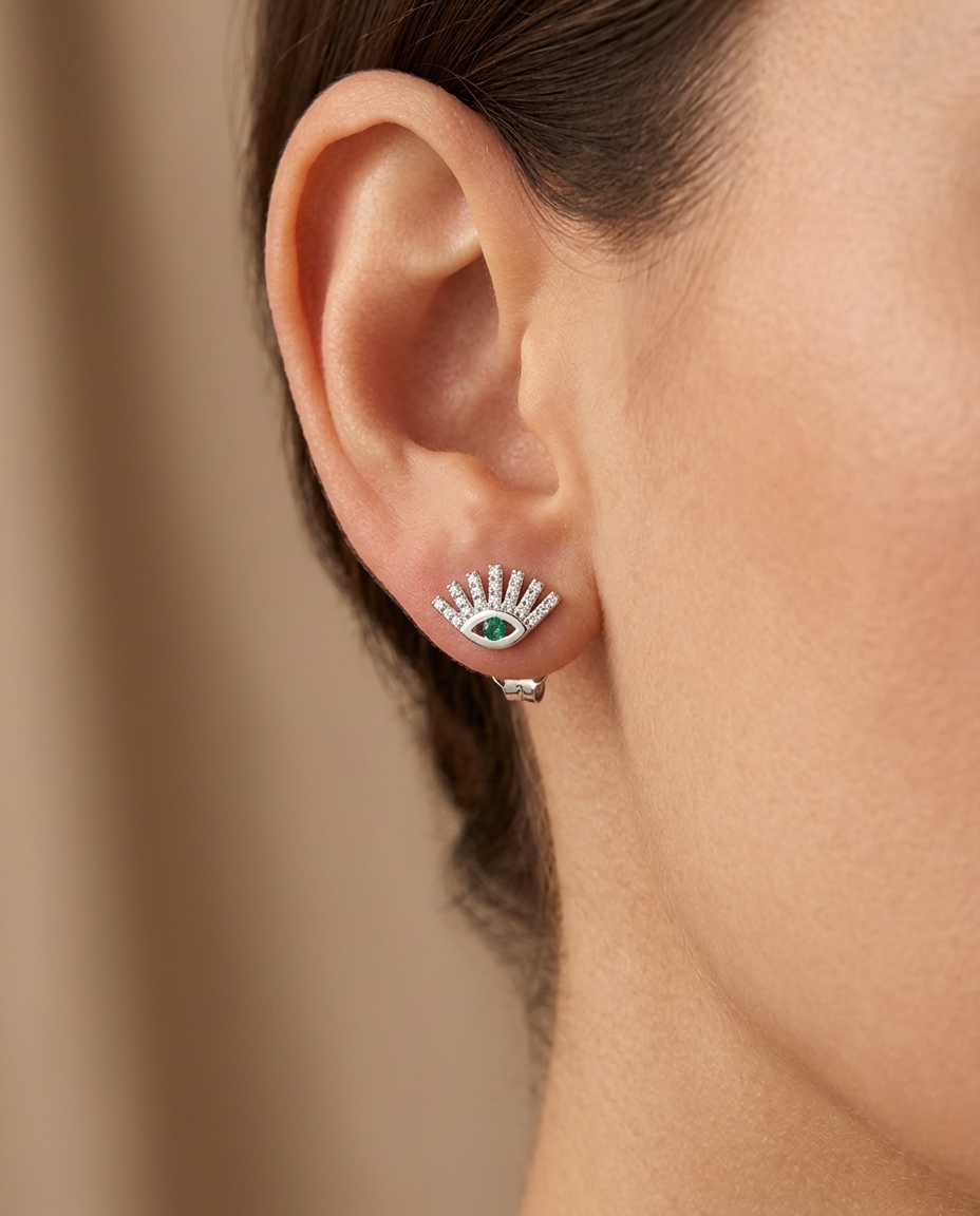 18KT White Gold Emerald and Diamonds Evil Eye Earring on model