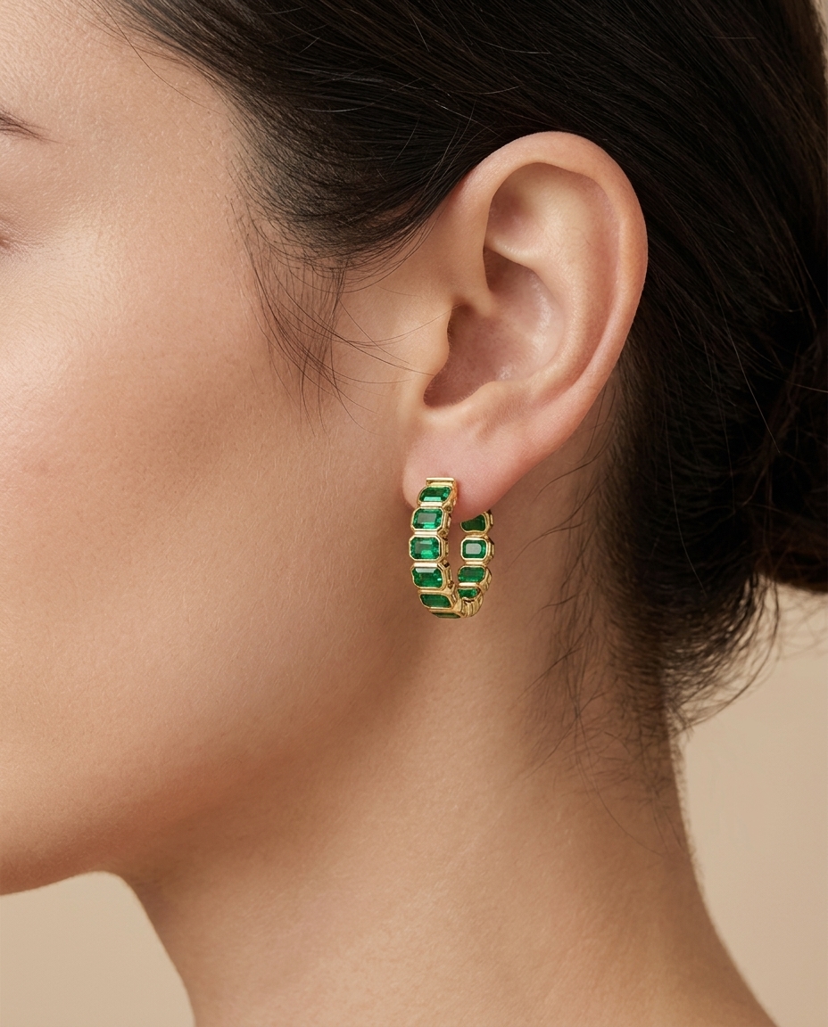 14KT Gold Emerald Hoop Earring (15 MM) on model