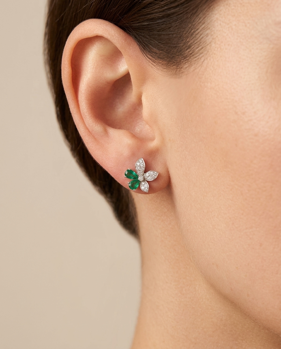 18KT White Gold Emerald and Diamond Earring on model