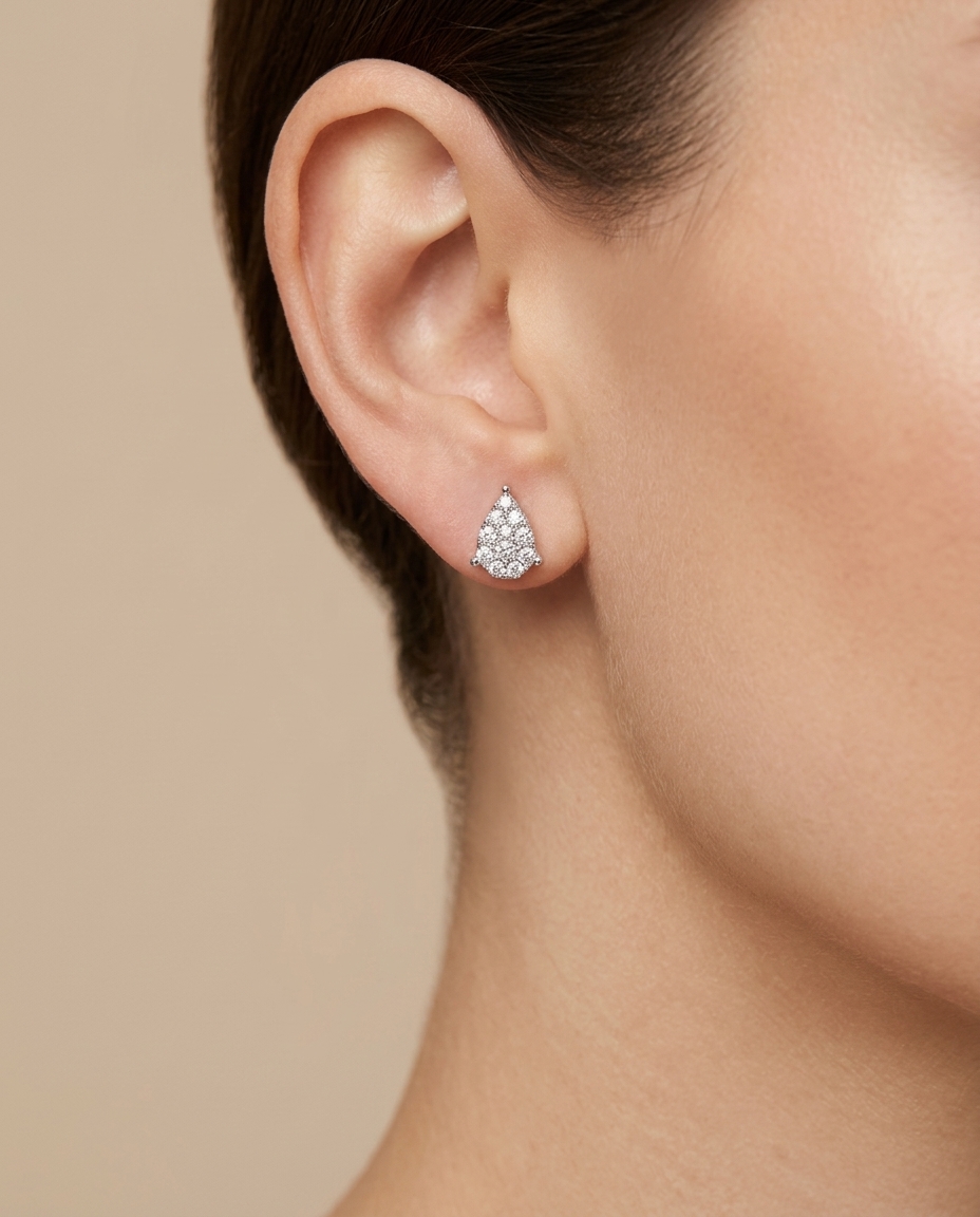 14KT Gold Diamond Pear Shape Earring on model