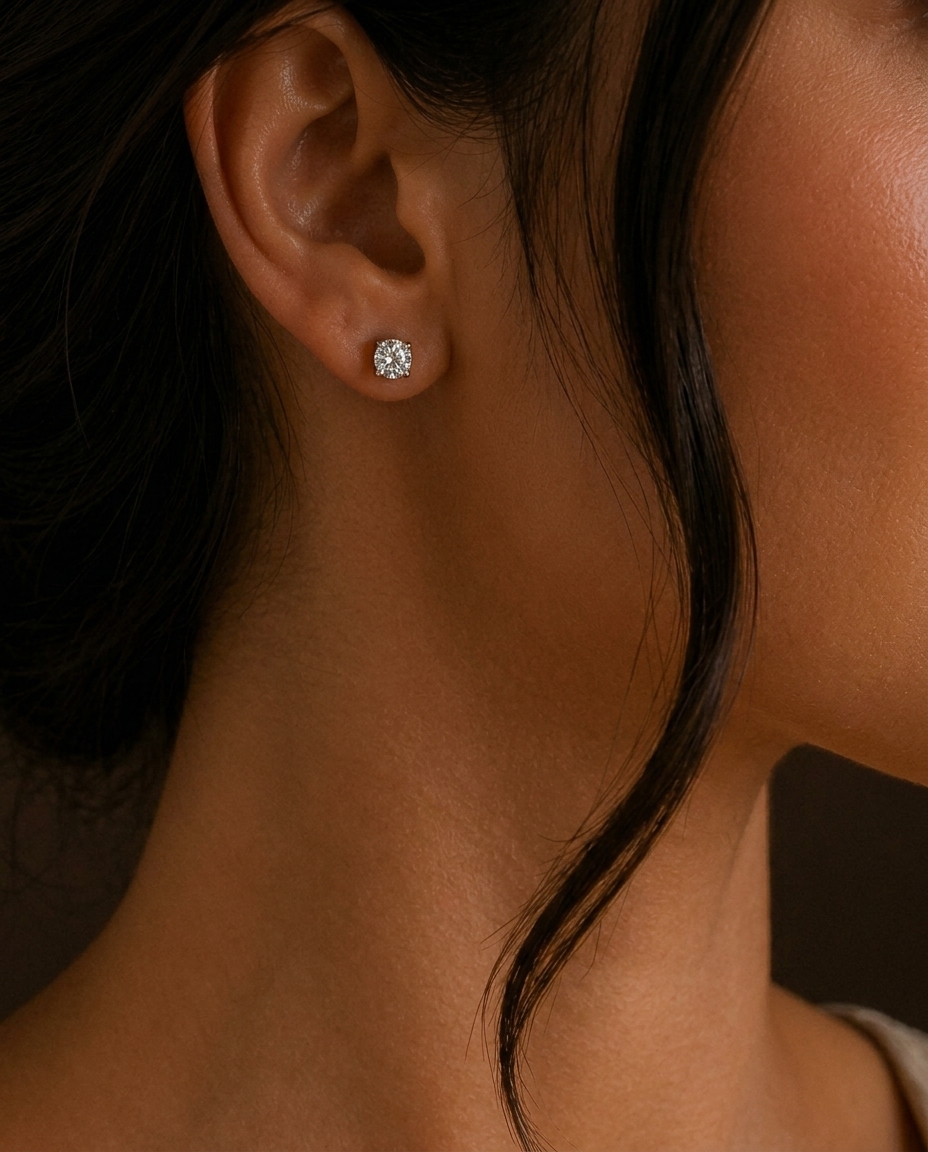 14KT Gold Solitaire Diamond Studs 4 Prong on model