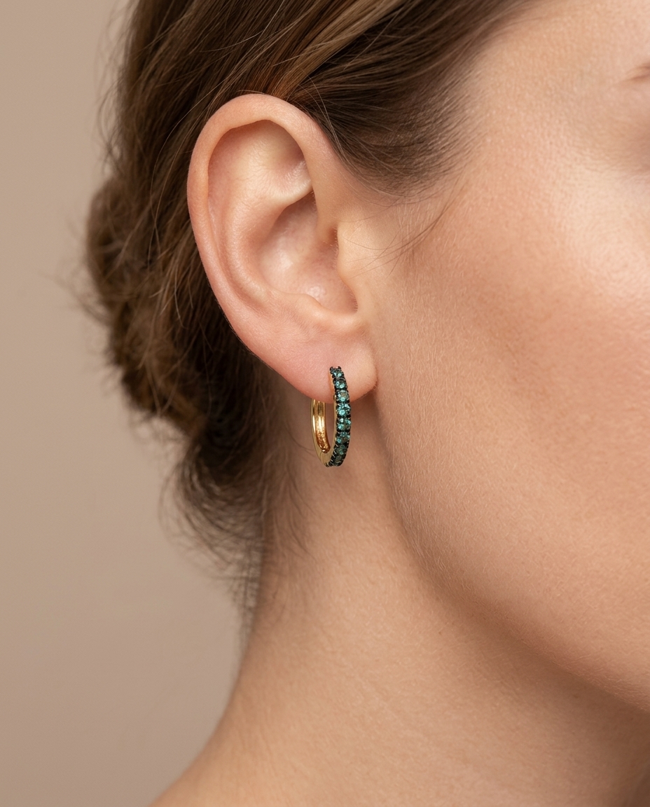14KT Yellow Gold Emerald Huggies Earring on model