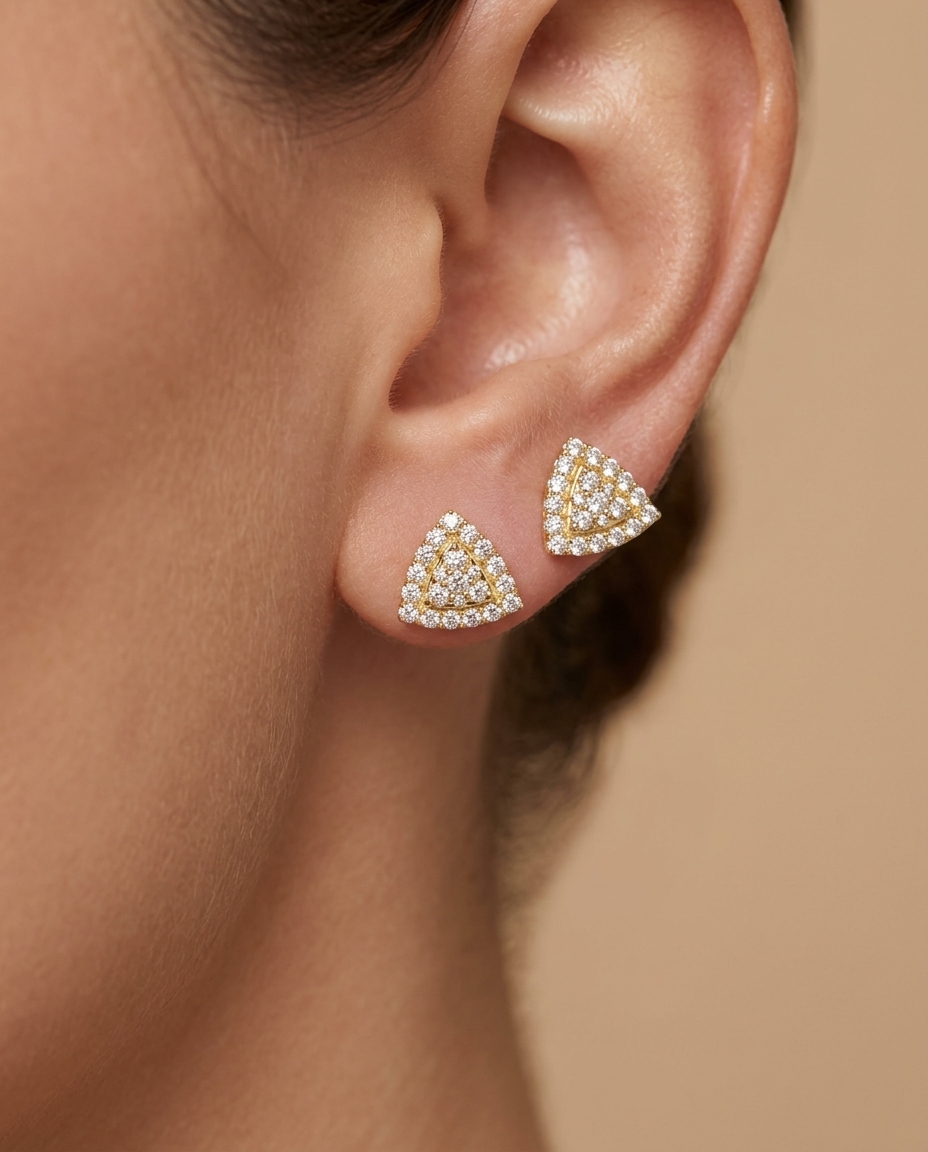 14KT Gold Diamond Triangle Ear Studs on model