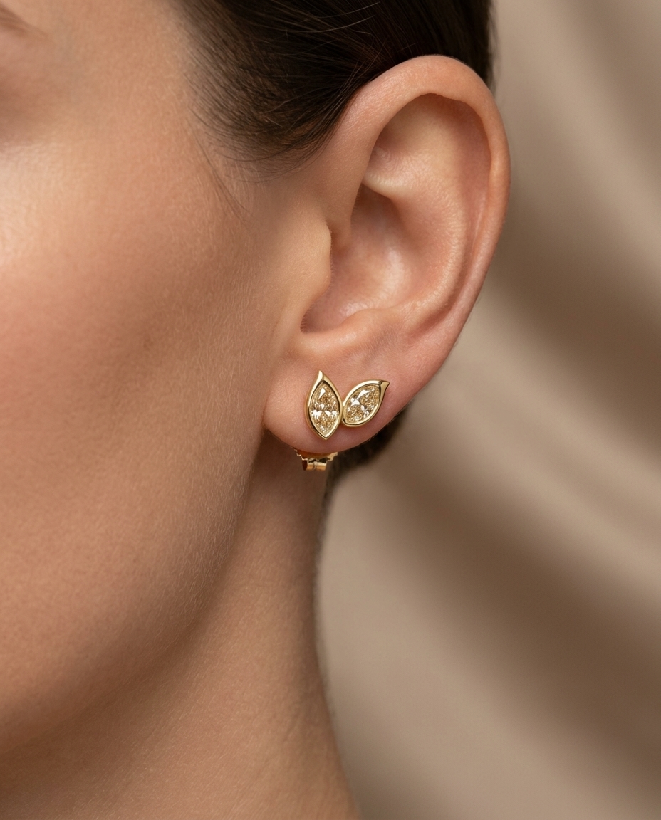 14KT Gold Marquise Diamond Earring on model