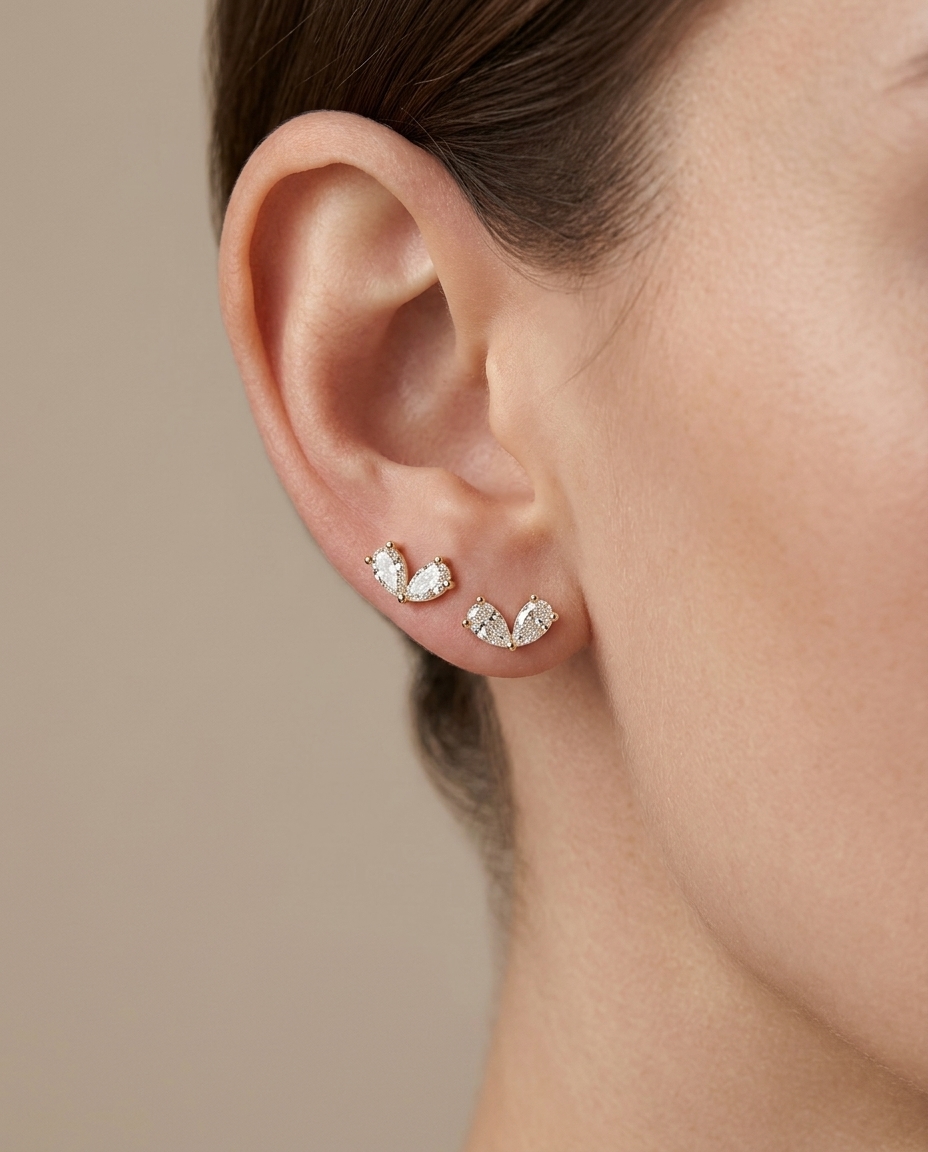 14KT Yellow Gold Pear Diamond Earring Studs on model