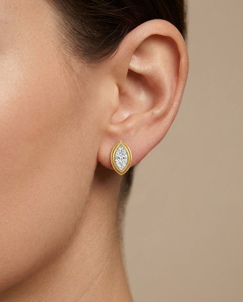 14KT Yellow Gold Marquise Diamond Bezel Earring Studs on model