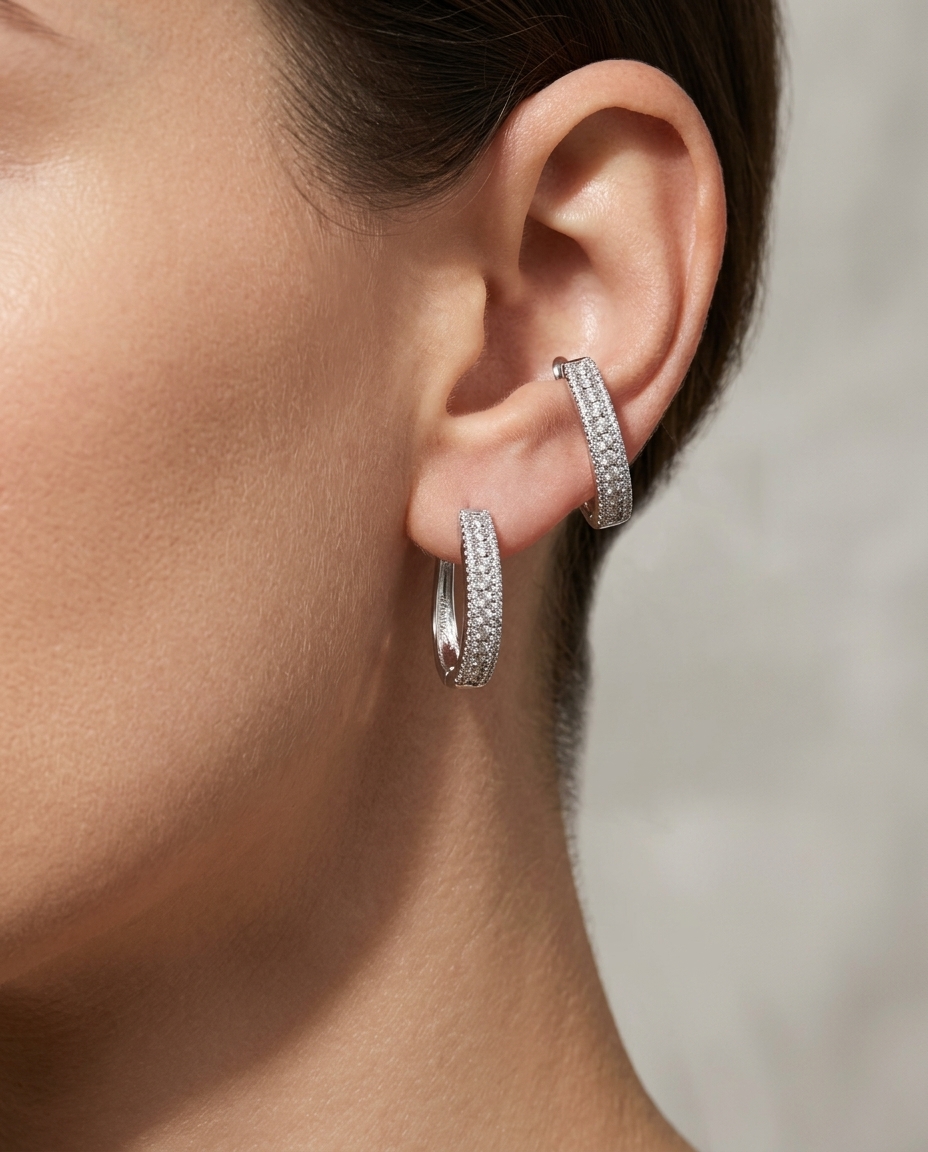 14KT White Gold Diamond Huggies on model