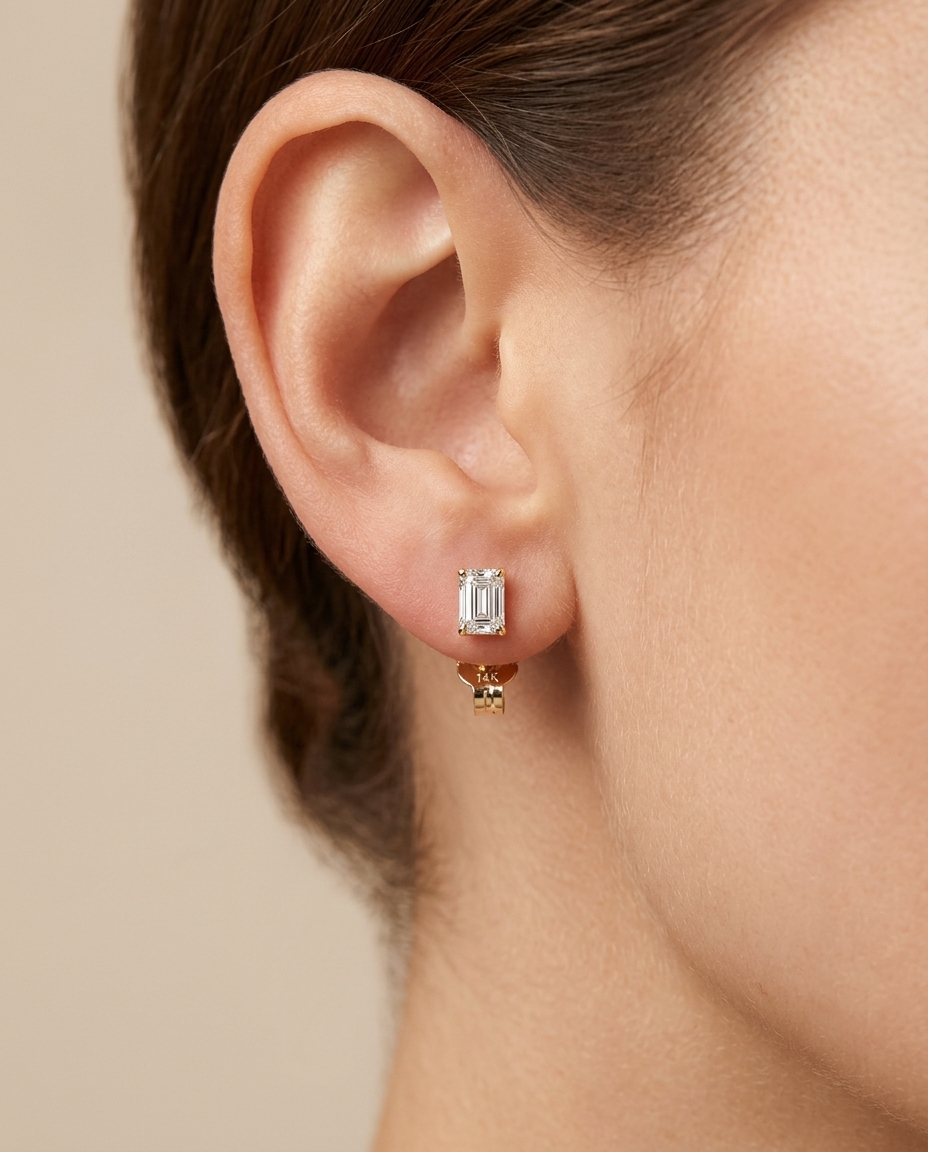 14KT Gold Emerald Cut Diamond Earring Studs on model