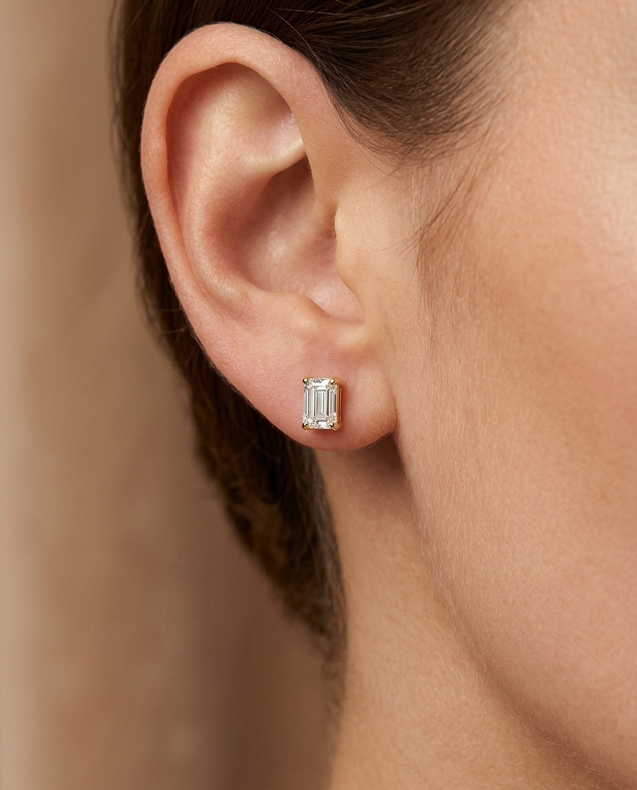 14KT Gold Emerald Cut Diamond Earring Studs on model