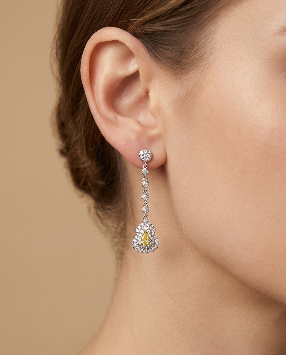 18KT White Gold Diamond and Yellow Diamond Earring on model