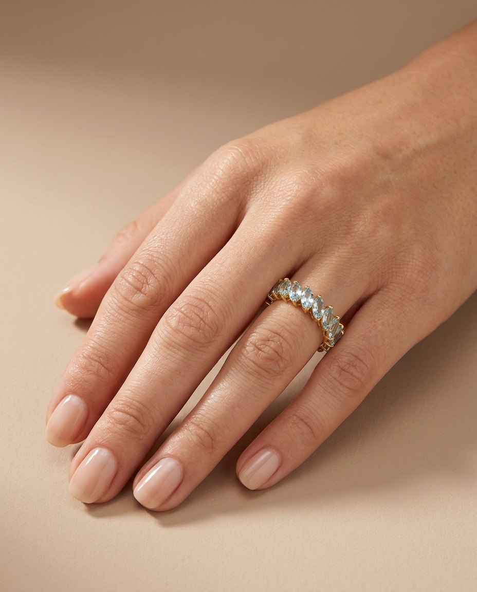 14KT Yellow Gold Marquise Shape Aquamarine Eternity Band on model
