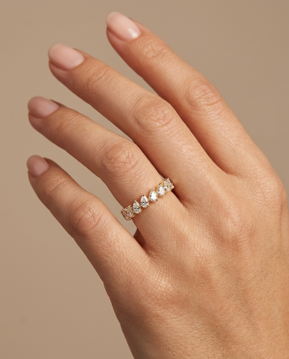 14KT Gold Ring with Pear Shape Diamonds on model